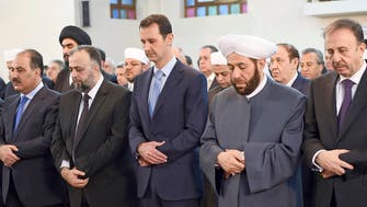 Syria’s Assad joins prayers to mark end of Ramadan 