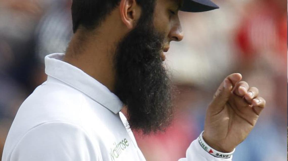 A wristband allegedly bearing the slogan "Save Palestine" is visible as England’s Moeen Ali