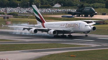 An Emirates Airbus A380 lands on the runway at Manchester Airport at Manchester Airport, northern England June 25, 2013. (Reuters)