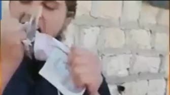 Video shows U.S. jihadist burning his passport in Syria 