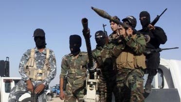 Iraqi soldiers and jihadists reuters