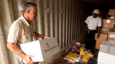 A Samaritan's Purse volunteer helps with supplies in Liberia in this undated handout photo courtesy of Samaritan's Purse. (Reuters)