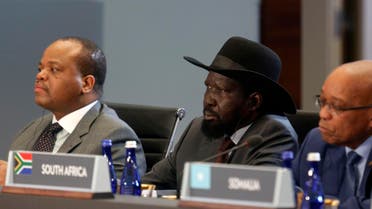 South Sudan President Salva Kiir Mayardit (C) listens to U.S. President Barack Obama speak at the first Leaders Session of the U.S.-Africa Leaders Summit at the State Department in Washington, August 6, 2014.