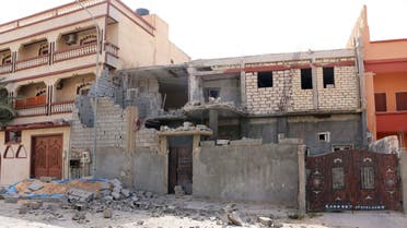 Damage to a house is seen following clashes between rival militias in the Janzour district on the outskirts of Tripoli, August 5, 2014. 