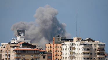 Smoke rises following what witnesses said was an Israeli air strike in Gaza City August 8, 2014. (Reuters) 