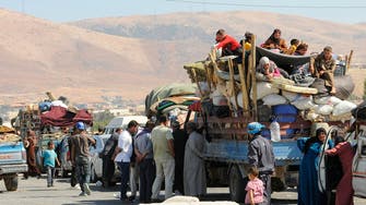 Stranded Syrian refugees in Arsal begin returning home 