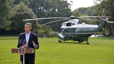 US President Barack Obama delivers a statement before boarding Marine One on the South Lawn of the White House on August 9, 2014 in Washington, DC. (AFP)
