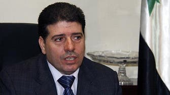 Assad reappoints Al-Halaki as Syria PM