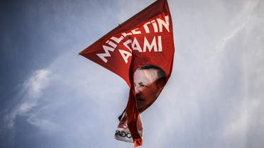 A flag depicting Turkish Prime minister Recep Tayyip Erdogan flutters in the air on August 8, 2014, in Istanbul. (AFP) afp 