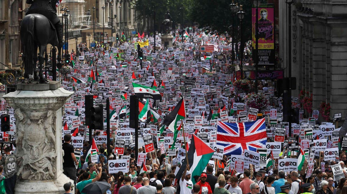 Hundreds of demonstrators march up Whitehall as they protest against Israel's military action in Gaza, in central London July 19, 2014. (Reuters)