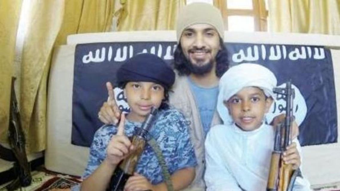 Saudi father posing with kidnapped children in Syria