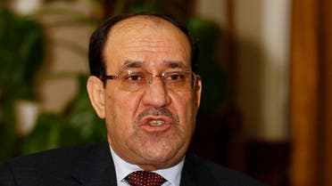 raq's Prime Minister Nuri al-Maliki speaks during an interview with Reuters in Baghdad in this January 12, 2014 file photo
