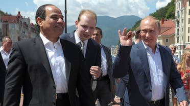 Russian President Vladimir Putin (R) and his Egyptian counterpart Abdel Fattah al-Sisi (L) walk on the main embankment in the Roza Khutor Village outside Sochi on August 12, 2014. (Reuters) 