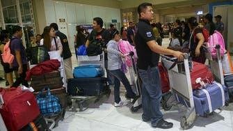 Philippines brings home hundreds more workers from Libya 