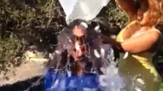 Oprah Winfrey screams through ice bucket challenge