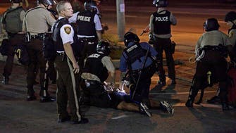 Obama struggles with role after Missouri death