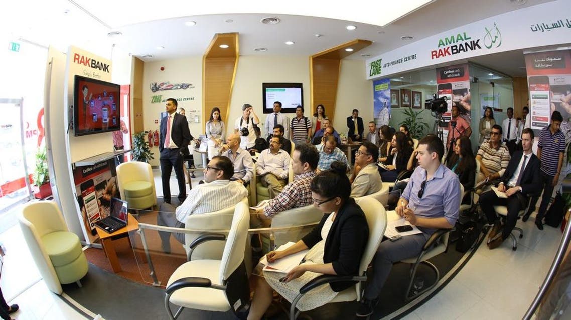 RAKBANK Head of Channels Masood Khan speaking to reporters at the launch of MobileCash. (Photo courtesy of: RAKBANK)