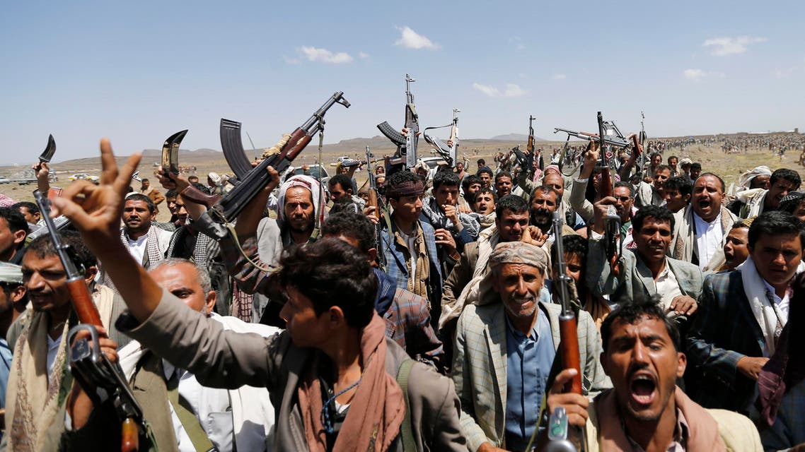Followers of the Shi'ite Houthi group brandish their rifles during a gathering near Sanaa August 20, 2014.