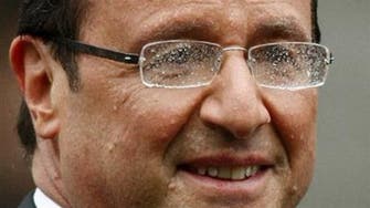 #IceBucketChallenge: Twitter mocks Hollande's rain-drenched speech 