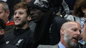 Controversial striker Mario Balotelli signs for Liverpool