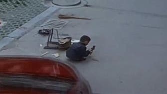 Shocking moment boy gets run over by a car, then walks away