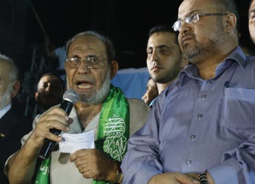  Senior Hamas leader Mahmoud Al-Zahar (L), appearing for the first time since the start of the seven-week conflict 