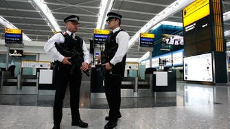 Britain charges man arrested at Heathrow Airport with terrorism offence