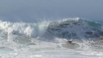 Surfers try to tackle ‘wedge’ waves in California