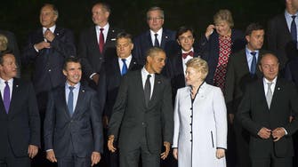 1800GMT: NATO summit looks to forge alliance against ISIS