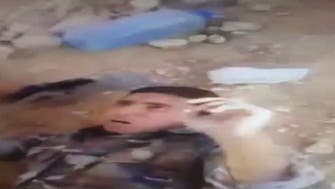 ISIS fighter abuses captured Lebanese soldier in new video