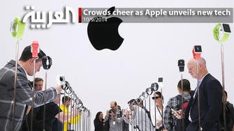 Crowds cheer as Apple unveils new tech