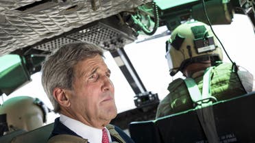 S Secretary of State John Kerry rides in a helicopter September 10, 2014 in Baghdad.  (AFP)