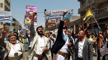 Yemeni Shiite Huthi anti-government demonstrators shout slogans during a demonstration near the government headquarters in Sanaa on September 9, 2014. (AFP)