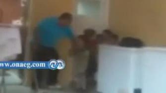 Video: Egypt orphanage head beats children 