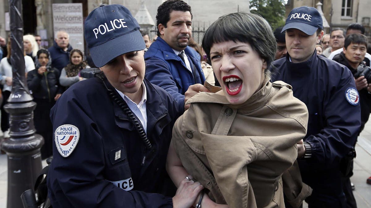 Vatican arrests Femen activist who bared breasts in Square