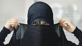 Tunisians debate niqab-wearing election nominee