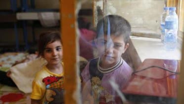 Children of a Christian family, who fled from the violence in Mosul stay at a school in Erbil, in Iraq's Kurdistan region June 27, 2014.  (Reuters)