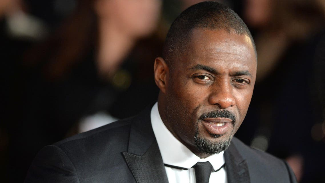 This December 5, 2013 file photo shows English actor Idris Elba, who played the role of Nelson Mandela, poses on the red carpet upon arrival to attend the royal film premier of Mandela Long Walk to Freedom in London. (AFP)