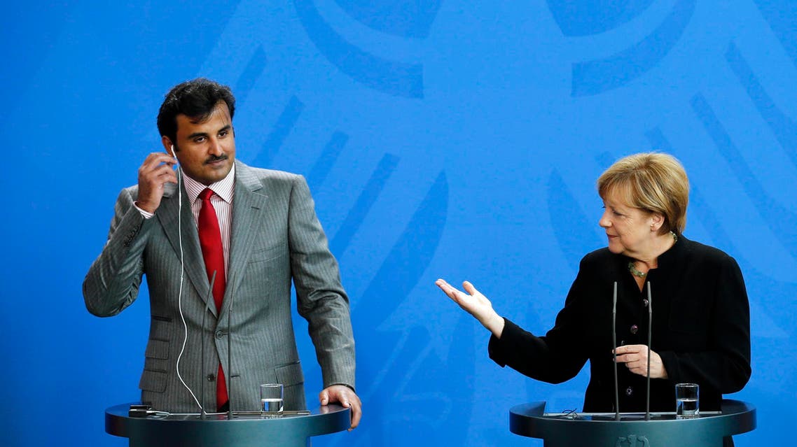 ميركل وأمير قطر