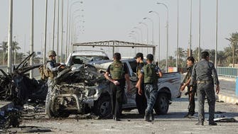 Suicide bombing, shelling kill 14 in Baghdad