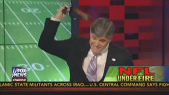 Fox News's Sean Hannity unbuckles belt, whacks it on desk
