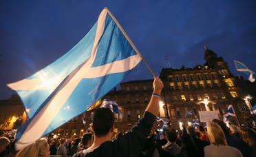 'Yes' campaigners holding Scottish Saltire flags gather for a rally in George Square, Glasgow, Scotland September 17, 2014. (Reuters)