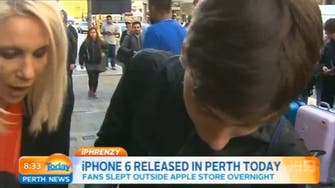 First person to buy an iPhone 6 in Perth drops it during TV interview