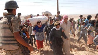Thousands of Syrian Kurds enter Turkey, fleeing ISIS advance