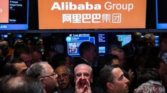Alibaba stock soars in jubilant trading debut