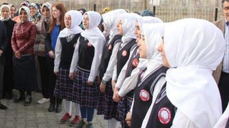 Turkey lifts ban on headscarves at high schools 