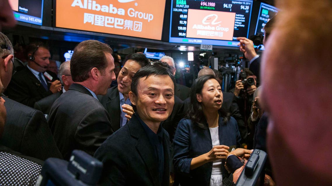 Alibaba Group Holding Ltd. founder Jack Ma greets traders at the New York Stock Exchange as he celebrates the company's initial public offering (IPO) under the ticker "BABA", in New York September 19, 2014. (Reuters)