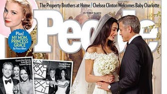 First photos of Clooney wedding show Amal’s lace gown