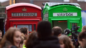 London turns its classic red phone boxes green 