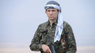 Syrian Kurds say American joins fight against ISIS 